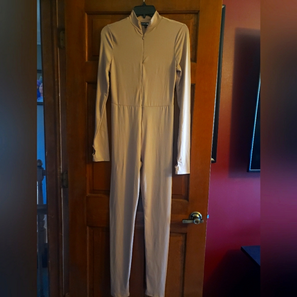 Fashion Nova Fitted Jumpsuit. Color Cream. Size M
